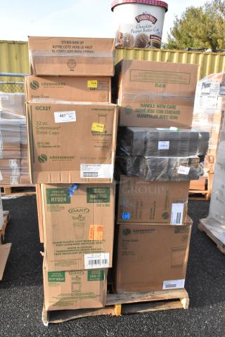 Boxes of Greenware and Dart drink cups on a pallet, some marked handle with care, sold as scratch and dent items.