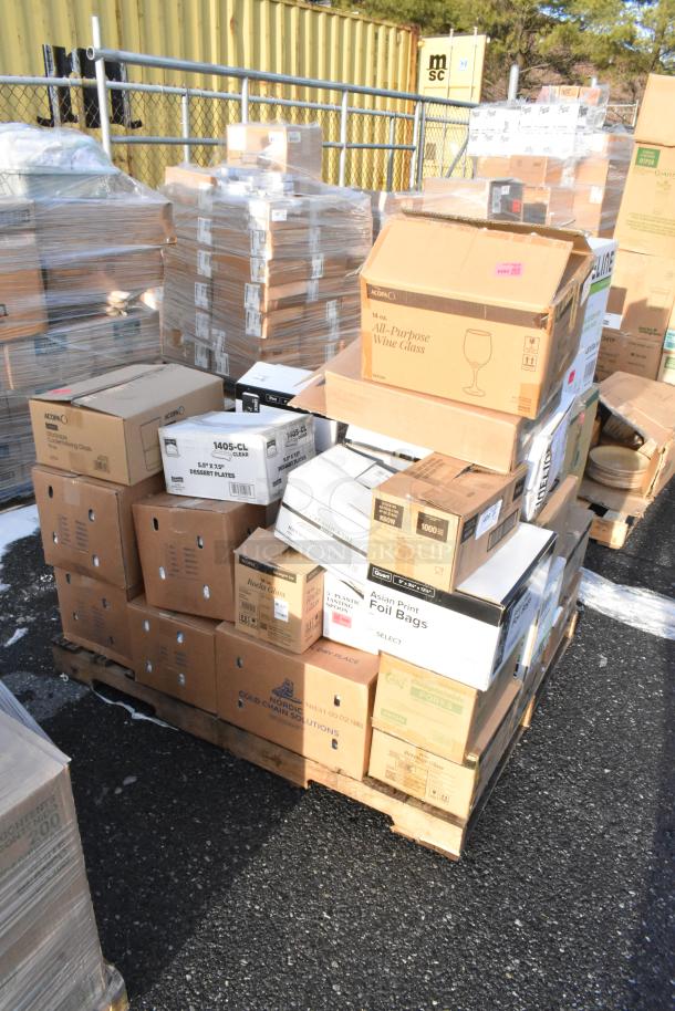 33 new scratch and dent items: tasting forks, foil bags, glasses, teaspoons, plastic flatware. Assorted boxed items on pallet.