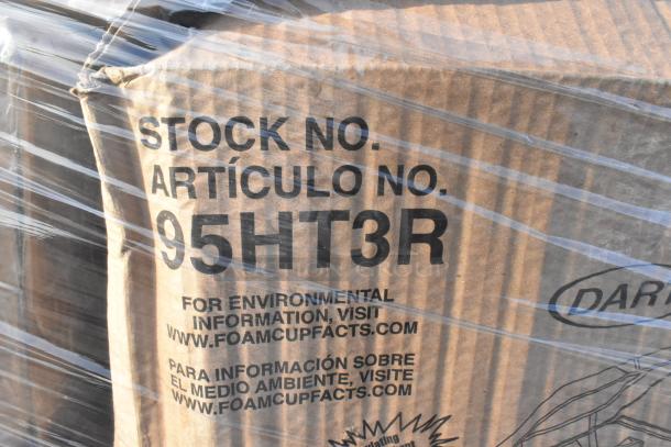 Box labeled "Stock No. 95HT3R" with environmental info link, wrapped in plastic. Contains scratch and dent food items.