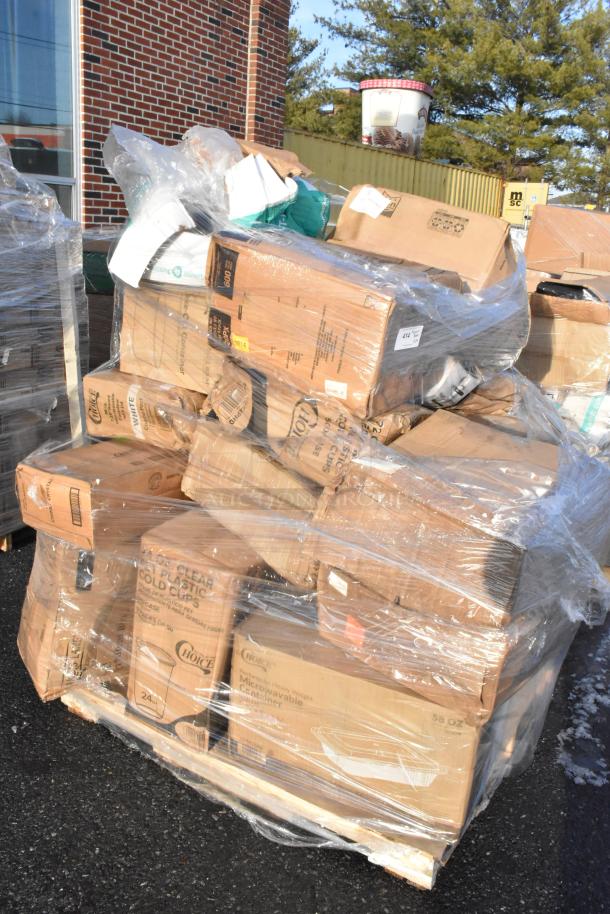 Pallet with 24 new scratch and dent items, including containers and gloves. Wrapped in plastic, visible labels detail item types.