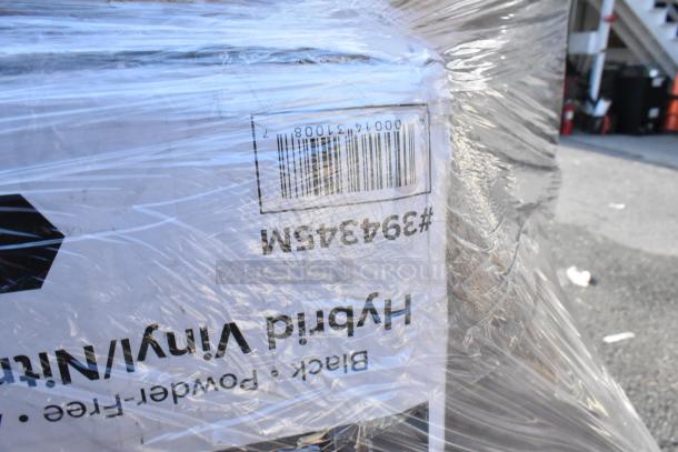 Palette with shrink-wrapped box marked #394345M, contains hybrid vinyl gloves. Bar code visible. Scratch and dent items.