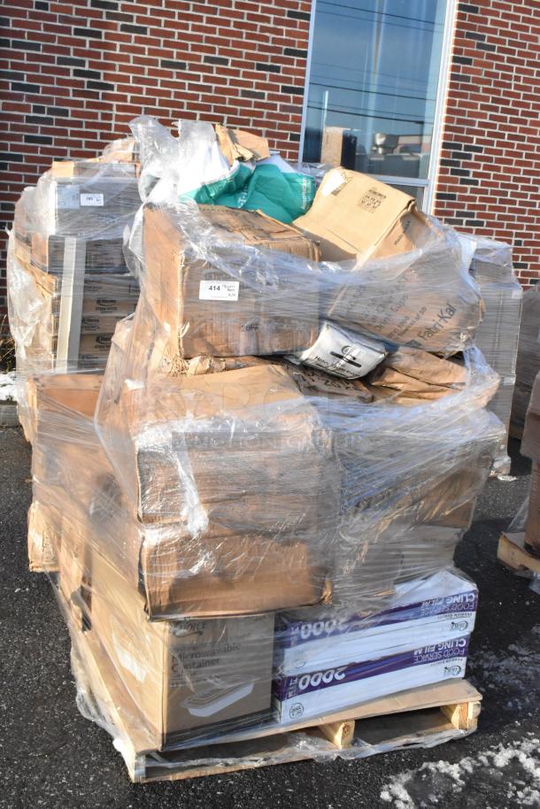 Pallet of boxed items labeled as new scratch and dent, wrapped in plastic. Includes containers and gloves.