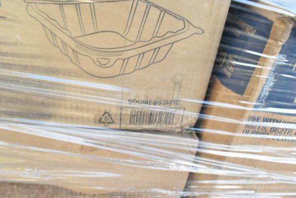 Brown cardboard box wrapped in plastic, labeled with 500MF663W1C and recycling symbols. Contains mixed scratch and dent items.