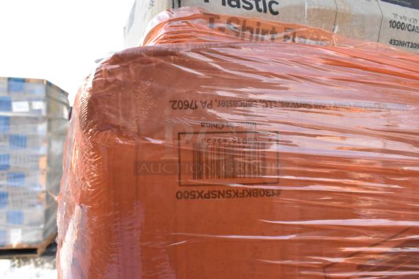 Plastic wrapped pallets with scratch and dent items, including T-shirt bags, cutlery packs, and portion cups, for auction.