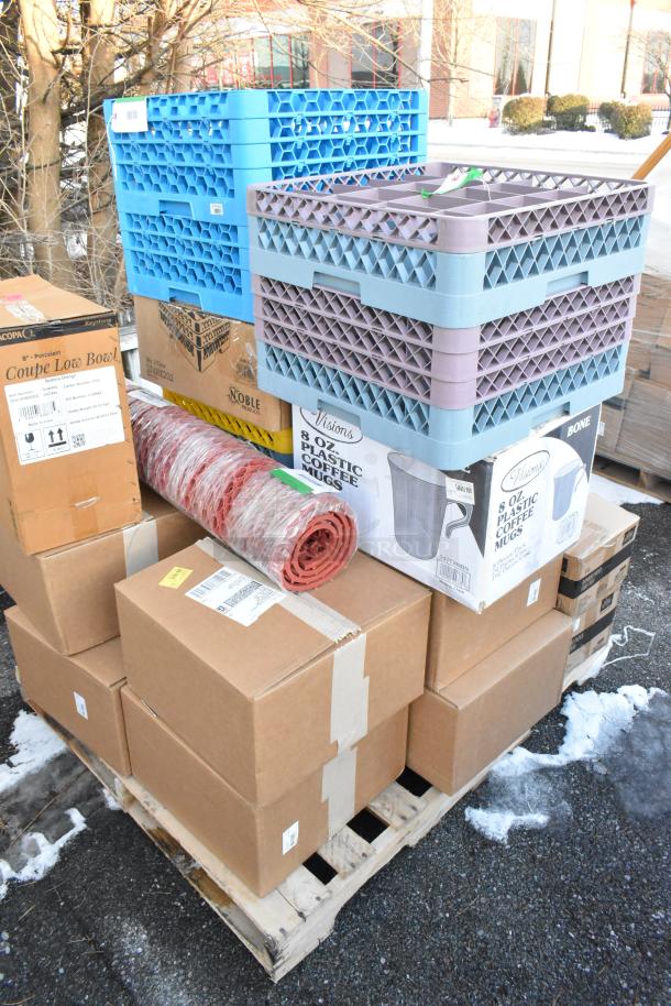 Pallet with stacked boxes of scratch and dent items: coffee mugs, food trays, bowls; some labeled Visions and Noble.
