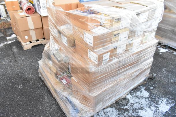 Pallet of boxed, brand new scratch and dent kitchen items, including fruit bowls, tumblers, and ramekins, wrapped in plastic.