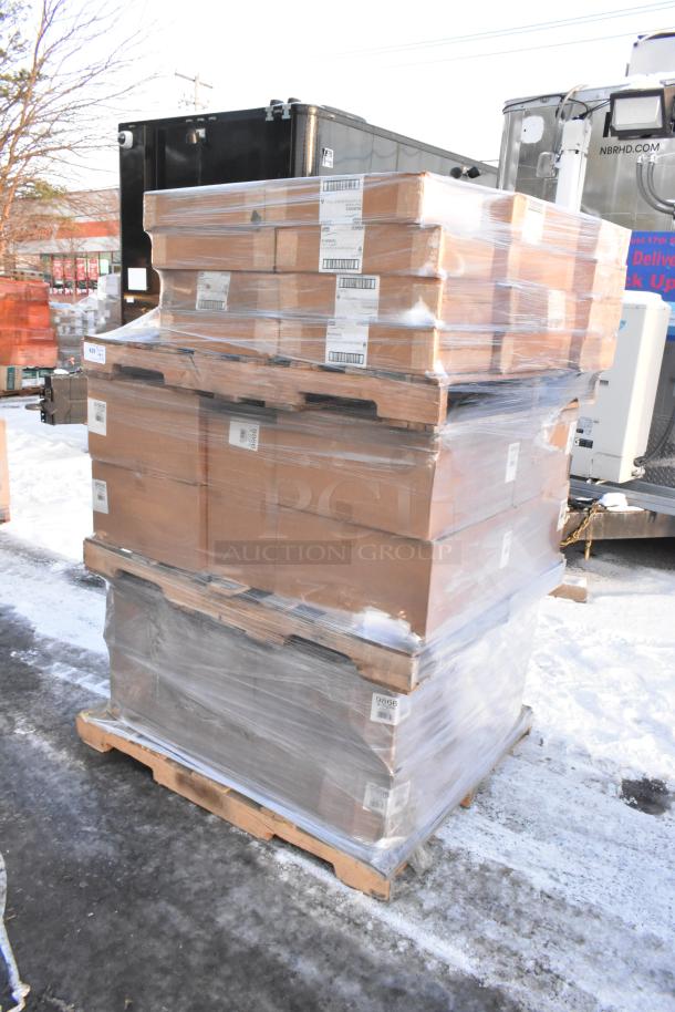 Pallet of 52 brand new scratch and dent items, including towel adapters, stacked in cardboard boxes with visible shipping labels.