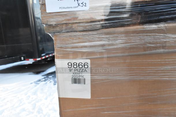 Stacked boxes labeled "9866 9'' Pizza Kraft 200/Pk" wrapped in plastic, indicating 52 brand new scratch and dent items.