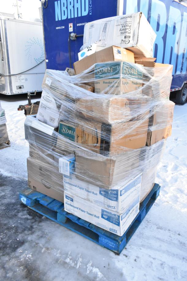 Pallet of assorted new scratch and dent items, including plates, portion cups, towels, cutlery packs in boxes.