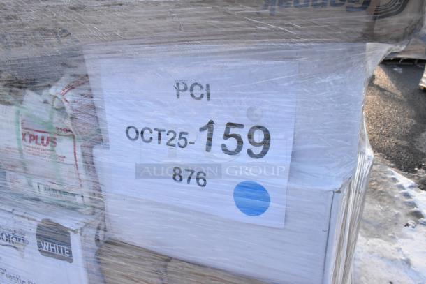 Pallet of scratch and dent items wrapped in plastic, labeled "OCT25-159." Includes napkins, cone cups, plates, cold cups.