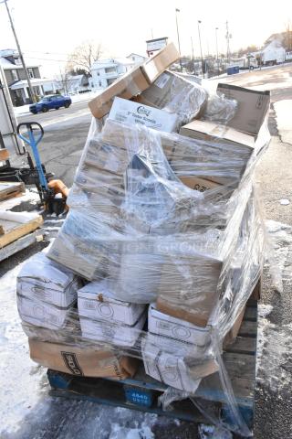 Pallet with 36 brand new scratch and dent items. Includes containers, napkins, trays, gloves in boxes, wrapped in plastic.