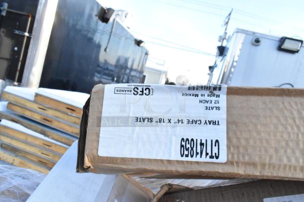 Cardboard box labeled "TRAY CAFE 14" x 18" SLATE", showing "CFS BRANDS" and "Made in Mexico", indicates scratch and dent items.