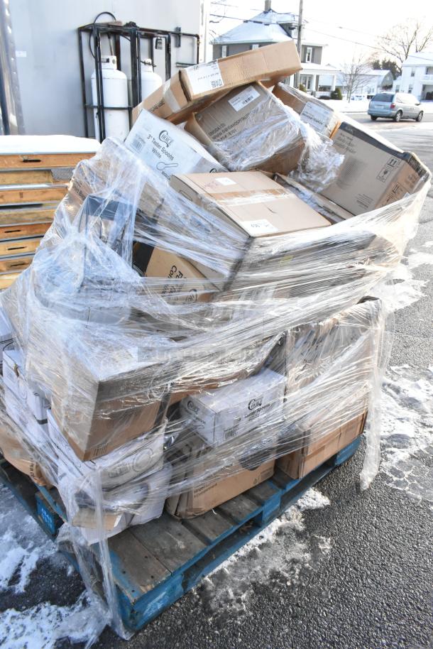 Shrink-wrapped pallet with 36 new scratch and dent items including containers, napkins, trays, and gloves. Visible packaging labels.