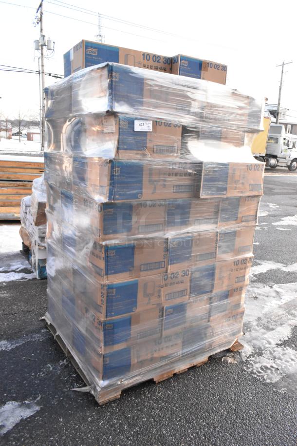 Pallet of 34 brand new Tork 10 02 30 Centerfeed Paper Wiper boxes, 1-ply, 7.7x11.8 inches, wrapped in plastic, ready for auction.