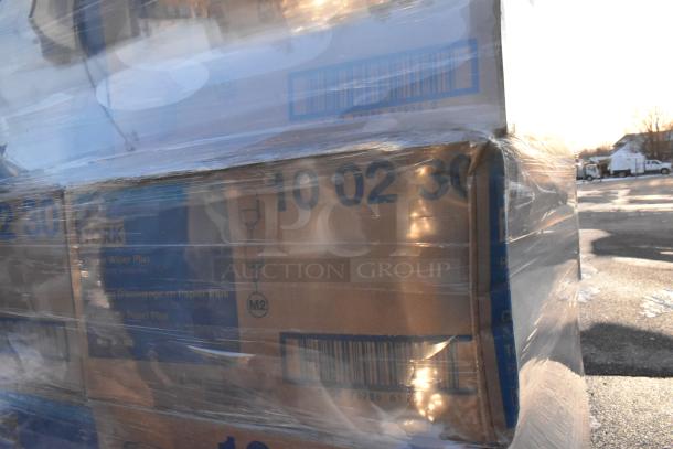 34 new Tork 10 02 30 centerfeed paper wipers, 1-ply, 7.7"x11.8". Items wrapped on a pallet, box labels visible.
