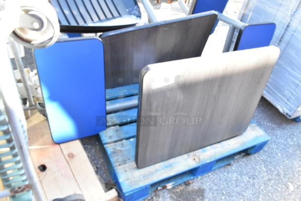 2 booth setups with tabletop and 2 benches on a blue pallet. Blue panels, wooden table. Auction lot includes 2 sets.