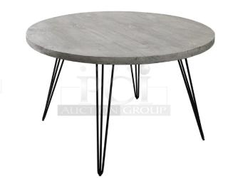 Brand new Werzalit 41.33" round tabletop in Ponderosa Grey with matte steel hairpin legs, Model 064776.