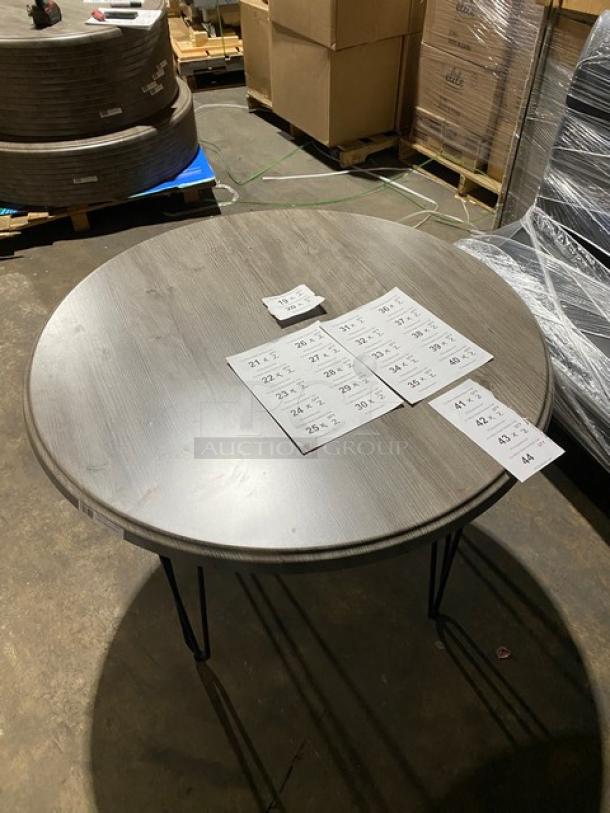 Werzalit Ponderosa Grey 41.33" round tabletop with matte steel hairpin legs. Model 064776, brand new condition.