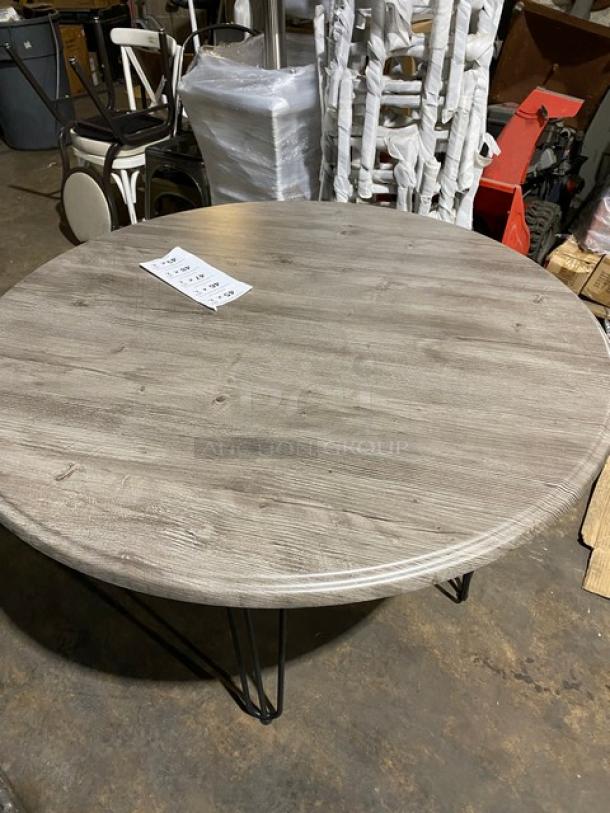 Brand new Werzalit 47.24" round tabletop in Ponderosa Grey with matte steel hairpin legs. Model 064411.