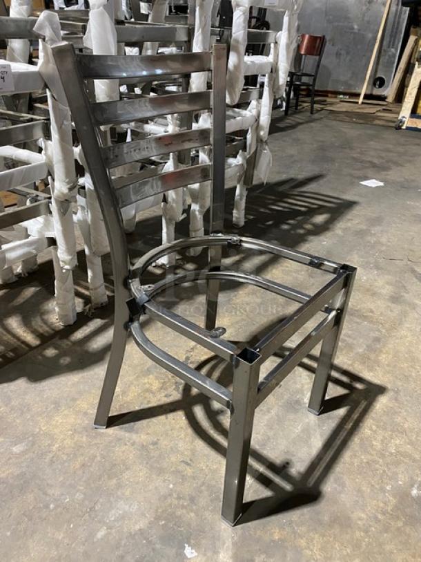 Brand new commercial metal ladder-back style stackable dining chair frame, no seat, durable and sturdy for high-traffic use.