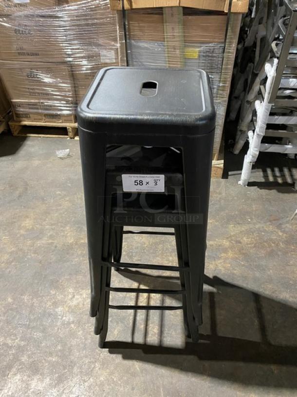 Brand new black metal industrial-style backless bar stool, stackable, commercial use, dimensions 58 x 3¾, durable design.