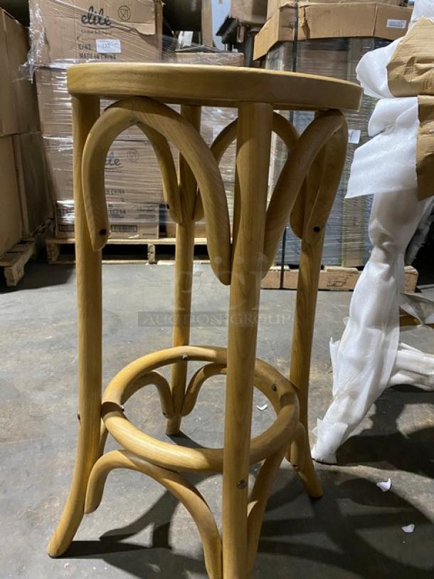 Brand new natural finish backless bentwood bar stool with curved legs and sturdy base. Suitable for commercial use.
