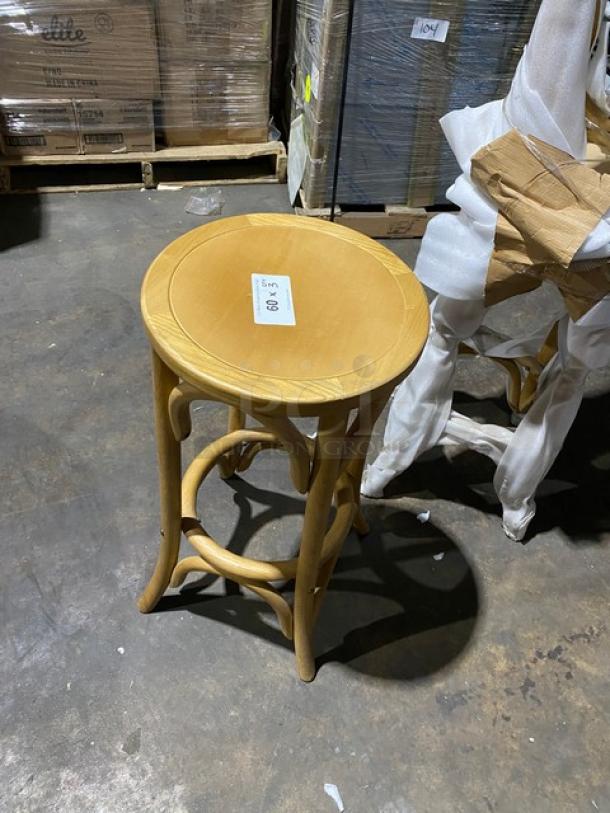 Brand new natural finish backless bentwood bar stool with sturdy curved legs, ideal for commercial use, in excellent condition.