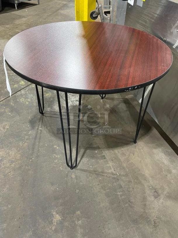 Brand new 40-inch round reversible bar-height table, mahogany/black laminate, model R40, with metal hairpin legs.