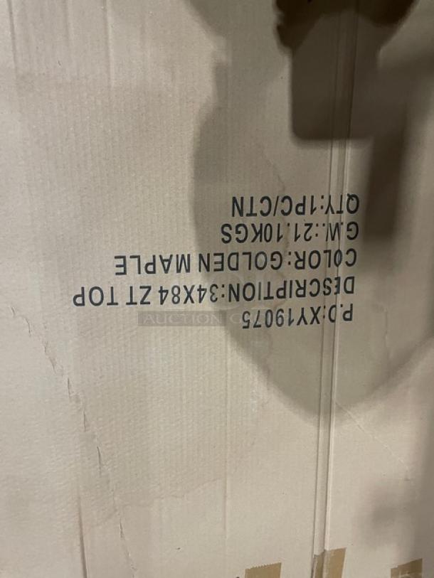 Brand new golden maple butcher block style countertop, 34"x84". Commercial use. Box markings show dimensions and weight.