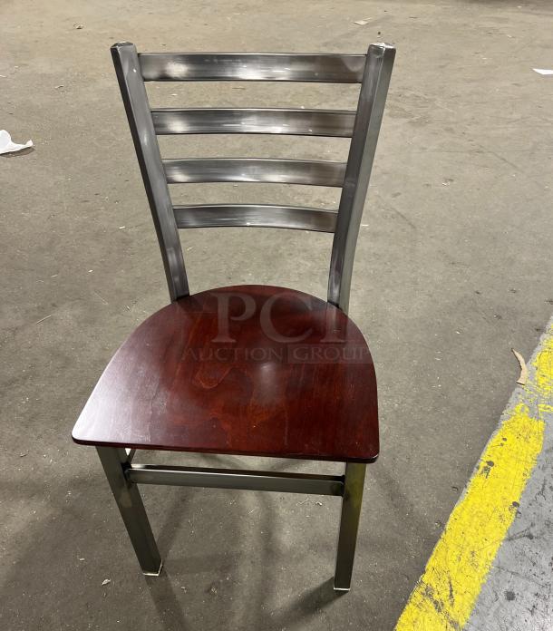Brand new metal ladder-back dining chair frame with mahogany wooden seat, stackable, excellent condition.