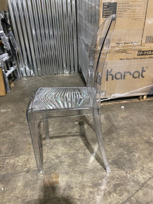 Brand New Flash Ghost Clear Poly Stackable Dining Chair, heavy duty, transparent design, pristine condition, side view.