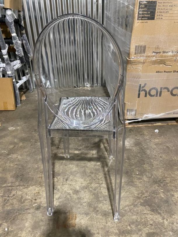 Brand new Flash Ghost clear heavy-duty poly stackable dining chair, durable and stylish, set of three per bid.