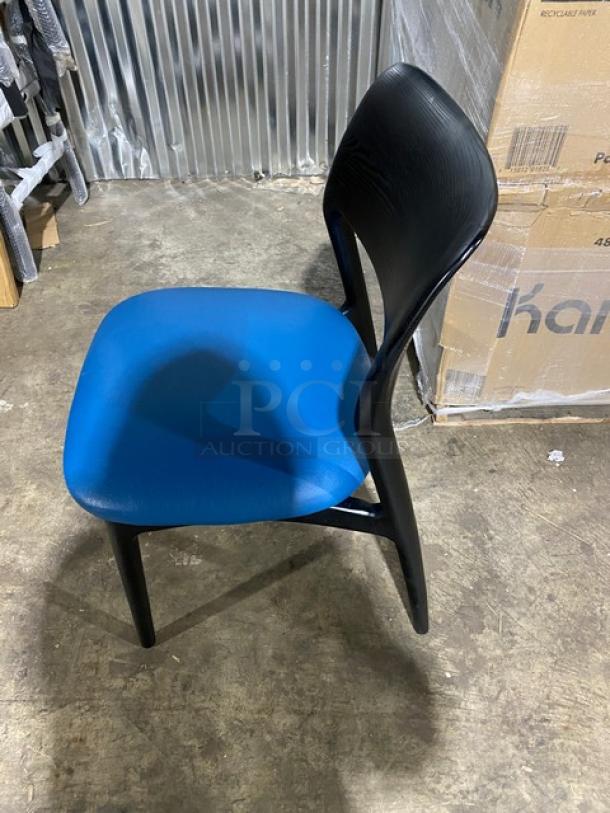 Brand new black poly frame dining chair with blue cushioned seat. Suitable for indoor/outdoor use. Auction for two chairs.