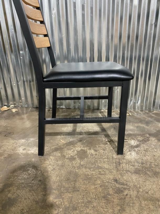 Brand new heavy-duty black metal dining chair with wooden slotted ladder back, black seat, set of 4.