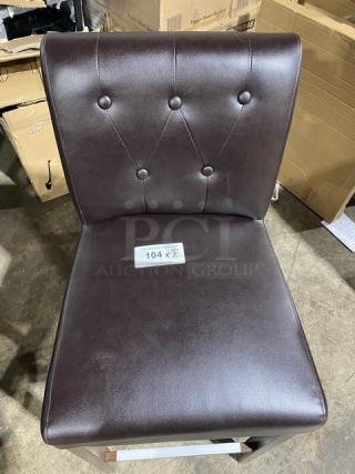 Brand new Silhouette low-back bar-height chair, chocolate finish, model 506, tufted design. Tag reads "104 x 2".