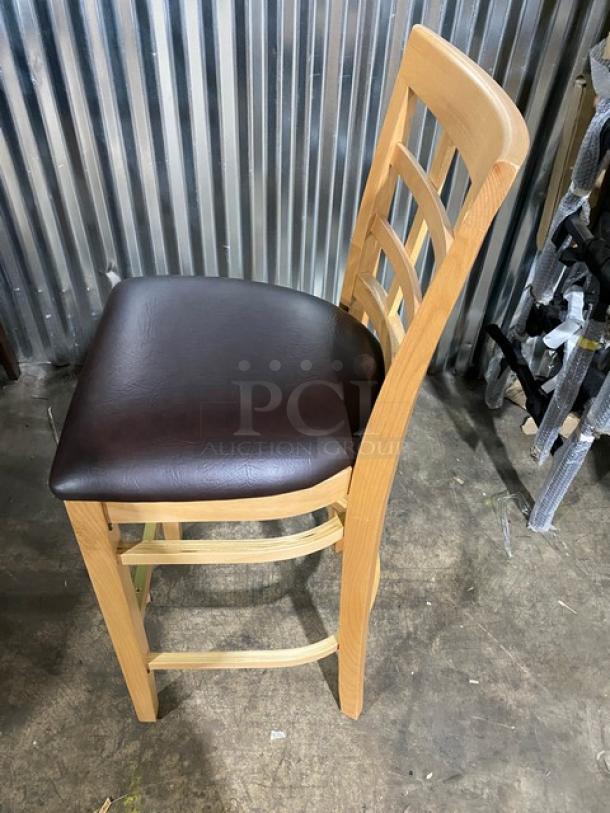 Bar-height wooden chair, model 4650, with chocolate cushioned seat, checker-style back, brand new condition.