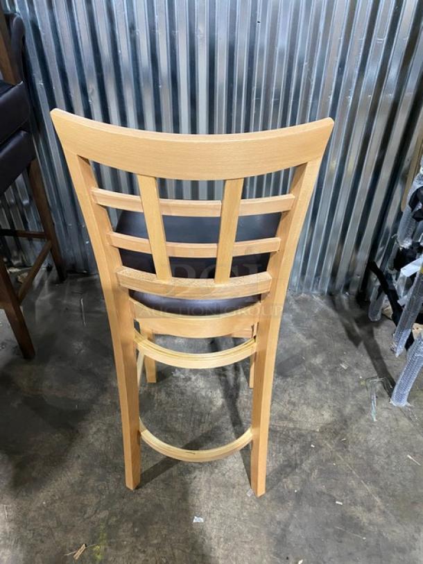 Bar-height wooden chair, Model 4650, with chocolate cushioned seat. Brand new condition, checker-style back.