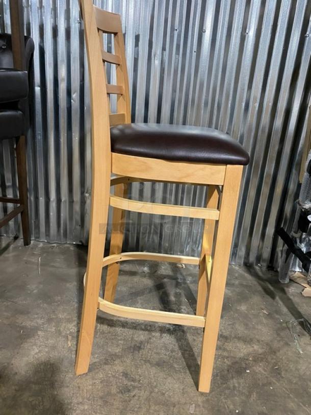 Brand new bar-height wooden stool with chocolate cushioned seat, model 4650, checker back design.
