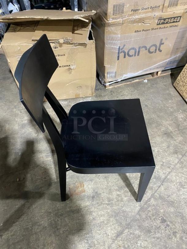 Brand new Toledo bar-height black bar stool with sleek design and smooth finish. Suitable for modern settings.