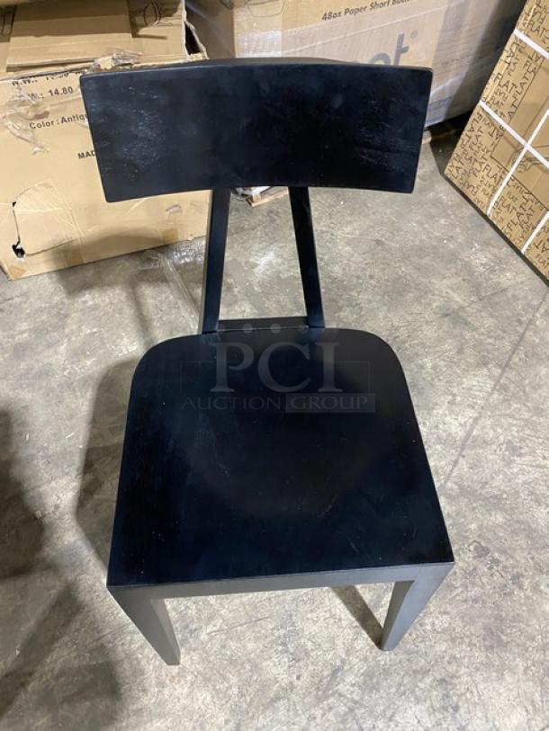 Brand new Toledo bar-height black bar stool with sleek design; perfect condition, no visible markings or tags.