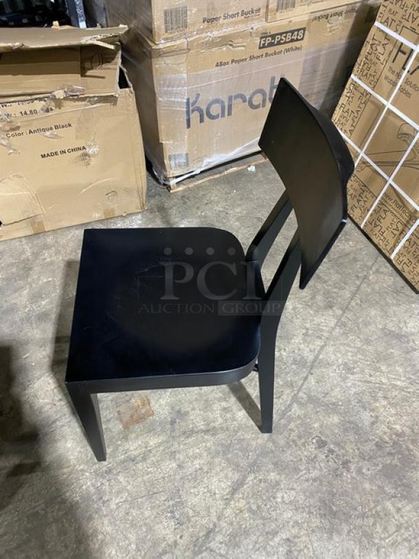 Brand new Toledo bar-height black bar stool, sleek design, excellent condition, auction bid doubles value.