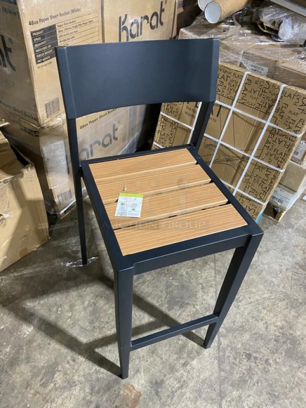 Brand new aluminum bar-height stool with teak slats. Modern design, excellent condition, includes product tag.