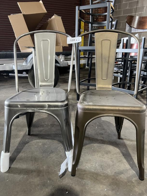 Industrial Tolix-style medal dining chairs, stackable design, metal construction, mixed finishes, auction tag 135 visible.