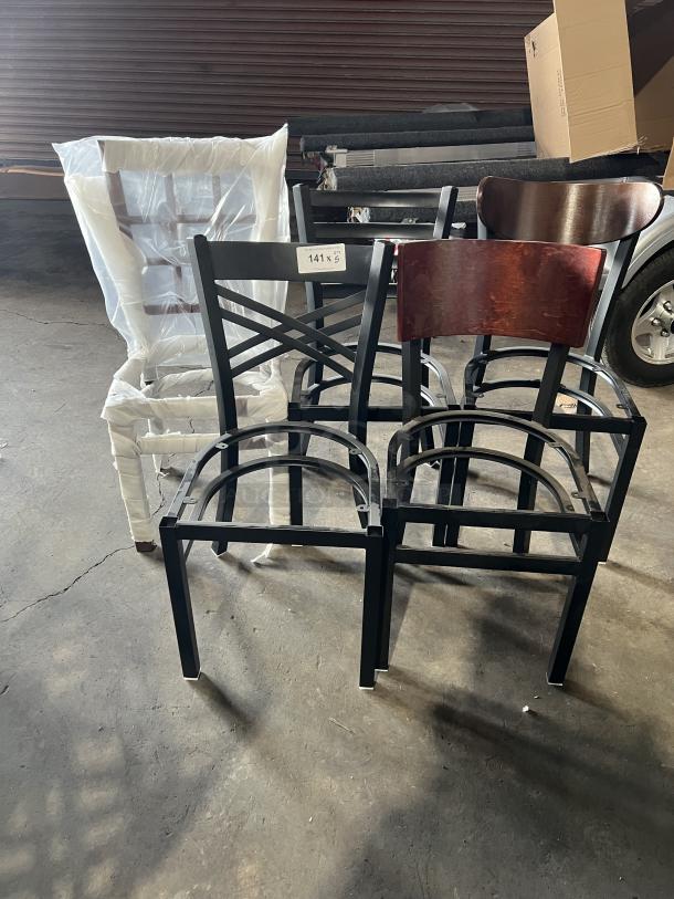 Brand new miscellaneous dining chairs, mix of wood and metal styles, with some wrapped in plastic. Lot marked "141 x 5."