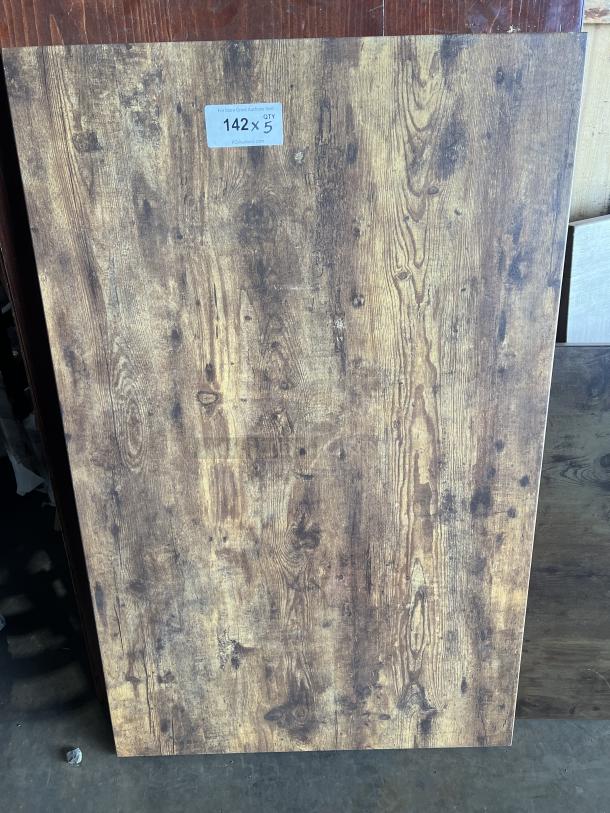 Wooden square tabletop with a rustic finish, showing a sticker labeled "142 X 5." Suitable for stainless steel table base.