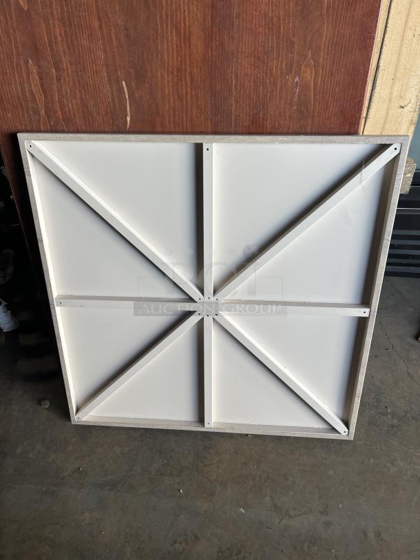 Stainless steel table base with white support, designed for wooden multi-style square/rectangular tabletops.