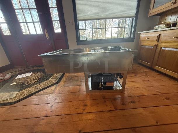 Wells RCF-200 refrigerated drop-in cold pan, 2-well design with sneeze guard, stainless steel, self-contained unit, for commercial use.