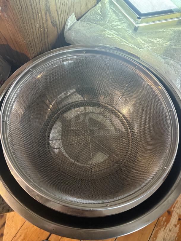 Commercial-grade 16" stainless steel mixing and sifting set, excellent condition, ideal for high-volume cooking.