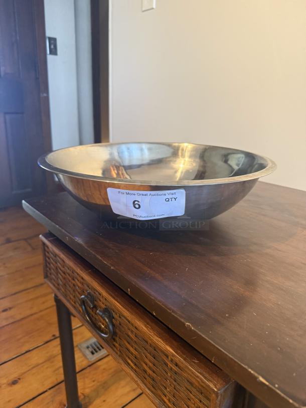 13" stainless steel mixing bowl, 13-quart capacity, commercial-quality, new condition. Label indicates auction info.