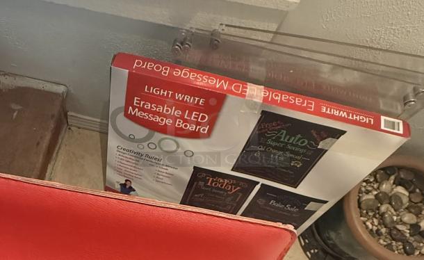 Lot of Lightwrite Erasable LED Message Boards and clear acrylic frames. Includes mounting hardware. Ideal for displays.